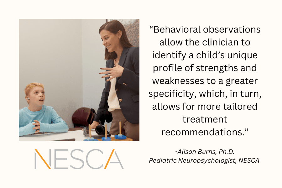 Neuropsychologist observing the behavior of a child being evaluated